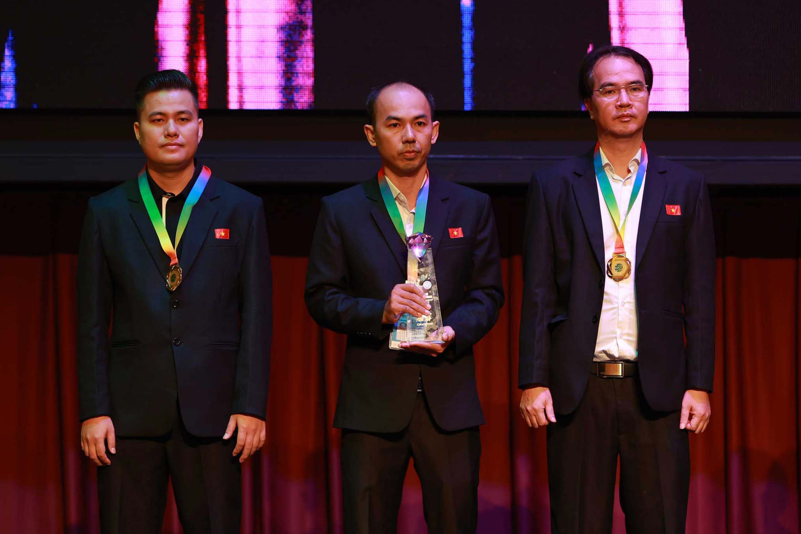 Men's Team Champion (Vietnam: Nguyen Thanh Bao & Lai Ly Huynh with Coach Vo Minh Nhat)